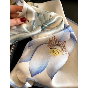 Soft silk square scarf with elegant blue lotus floral pattern for women's neck protection