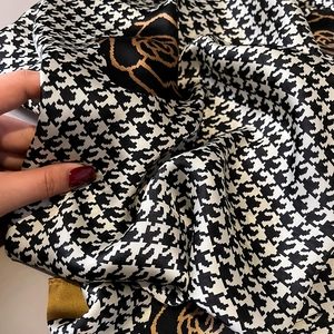 Elegant houndstooth silk shawl with golden rose patterns and premium satin finish