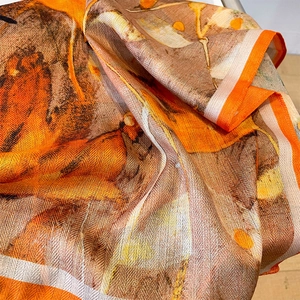 Floral silk square scarf with herringbone texture in orange and cream tones