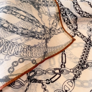 Elegant chain pattern silk scarf with H-shaped links and brown rolled edges for women