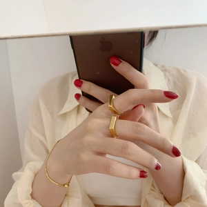 Minimalist gold geometric rectangular ring and slim bracelet set for modern women