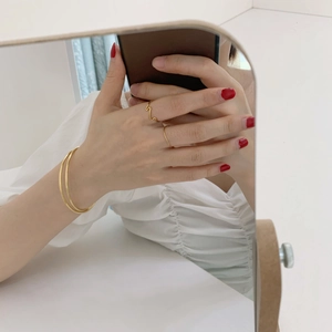 Minimalist 18k gold plated titanium steel wavy ring and bracelet set for women