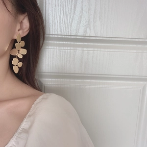 Minimalist gold multi-layered leaf drop earrings with elegant geometric metal plates