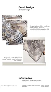 Close-up of printed silk scarf with neat machine-stitched edges and grey floral pattern