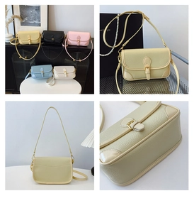 Nahaufnahme der Litschi-Maserung und Metallschnalle dieser kleinen quadratischen Tasche
