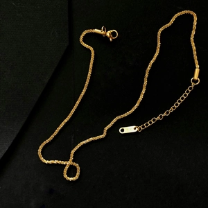 Elegant 18K gold-plated snowflake chain necklace with lobster clasp and adjustable link