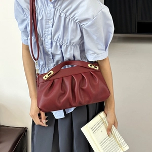 Elegant burgundy pleated faux leather shoulder bag with gold hardware for women