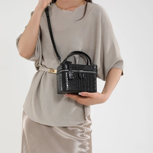 Fashionable black crocodile pattern vanity case bag with top handle and crossbody strap