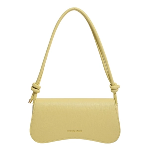 Minimalist yellow lychee grain leather shoulder bag with decorative knotted strap and gold hardware