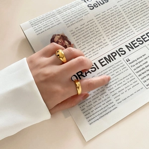 Minimalist gold dome rings set in polished finish, elegant thick band rings for women