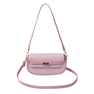 Pink minimalist crossbody bag with geometric pattern flap and metallic twist lock