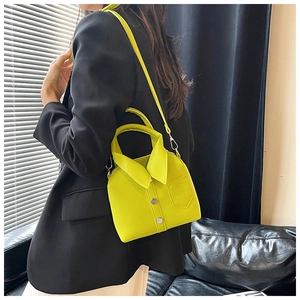 Fashionable shirt-shaped handbag in vibrant lime green with lapel and button details