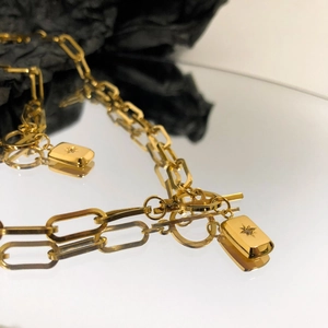 Collier à grosse chaîne dorée vintage avec pendentif étoile à huit branches et zircon