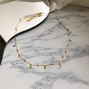 Detailed close-up of 18k gold plated choker showing fine beads and K18 hallmark tag