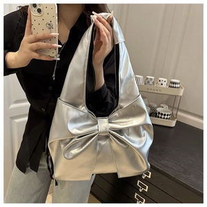 Silver metallic bow handbag with silk-like pleated texture for women, spring 2025 style