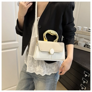 Chic women handbag with golden metal handle and straw texture flap detail