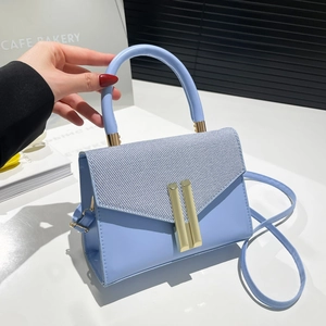 Light blue retro crossbody square bag with woven texture flap and golden metal lock