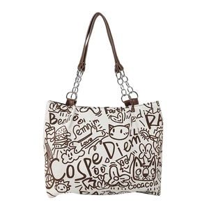 Graffiti canvas tote bag with brown leather straps and artistic cat burger patterns