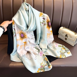 Elegant light blue silk-like floral scarf with large yellow chrysanthemum pattern