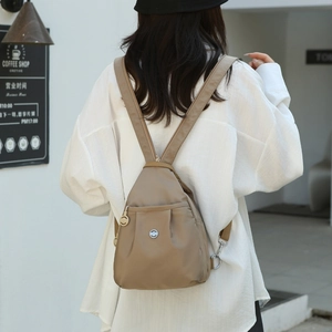 Mini khaki nylon backpack for women with anti-theft design and stylish casual look