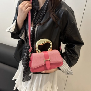 Fashionable magenta crossbody bag with gold H hardware and metal handle for women