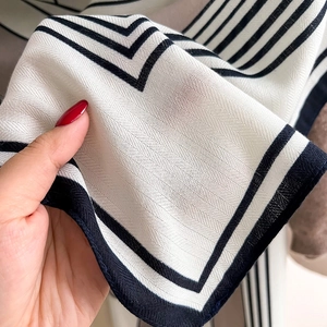 Classic black and white striped scarf with refined herringbone weave texture for women