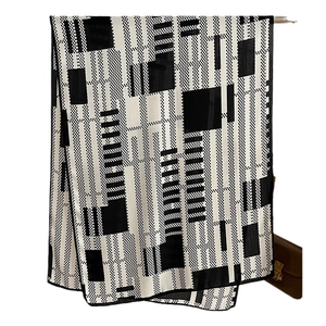 Elegant black and white geometric pixel pattern silk scarf for autumn warmth