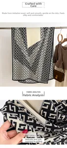 Macro detail of soft black and white geometric wool-like fabric texture on long scarf