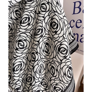 Elegant oversized shawl scarf with black and white camellia floral pattern and border
