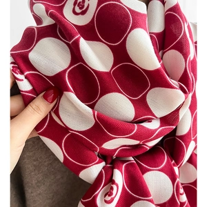 Red and white polka dot shawl with camellia flower patterns and herringbone weave texture