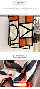 Macro detail of soft twill texture on a geometric color-block faux cashmere scarf