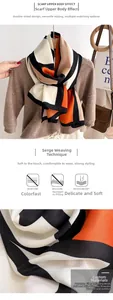 Detail of color-block scarf featuring twill weave texture and polyester wool-like fabric