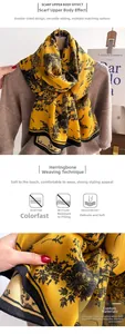 Detail of ginger yellow scarf with French vintage print and twill weave wool texture