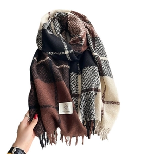 Thick oversized plaid scarf with tassels in brown and white cashmere-like soft fabric