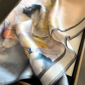 Elegant mulberry silk floral scarf presented in a premium grey and orange gift box