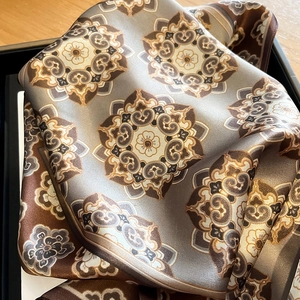 Elegant mulberry silk square scarf with caramel mandala pattern in black gift box