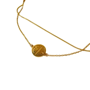 Double-layered gold-plated titanium steel bracelet featuring snake chain and hollow pendant