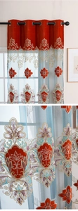 Detail of luxury European style gold floral embroidery on red and blue curtains
