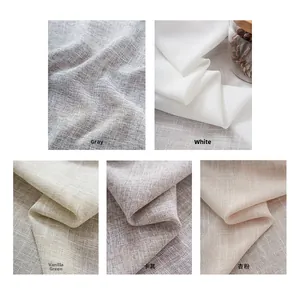 Close-up of premium linen textures in grey, white, green, khaki, and apricot pink colors