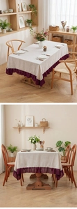 Detail of cream linen tablecloth with purple ruffled hem in a rustic wooden dining room