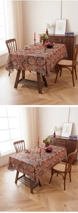 Detail of bohemian rectangle tablecloth with vibrant geometric patterns and laser-cut edges