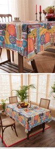 Detail of scalloped edge and bohemian geometric print on ethnic woven tablecloth