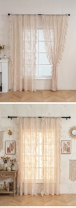 Detailed view of French vintage lace curtains with floral patterns and ruffled edges