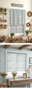 Detail of light blue floral cafe curtain with semi-sheer fabric and rod pocket design