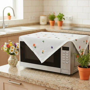 White chiffon dust cover for microwave with colorful floral embroidery and elegant lace edge