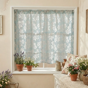 Light blue floral lace short curtain for kitchen window in a cozy rustic farmhouse setting