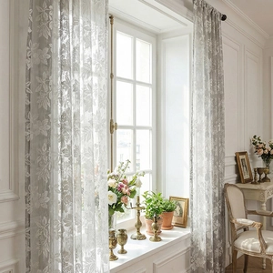 Elegant grey French lace curtains with floral embroidery for a modern living room decor