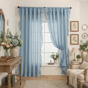 Light blue ruffle sheer curtains with rod pocket design for a French romantic balcony