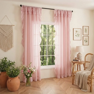 Pink sheer curtains with ruffled edges for a romantic bohemian living room decor