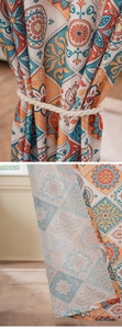 Detail of bohemian geometric pattern curtain with thick cotton rope tie for home decor